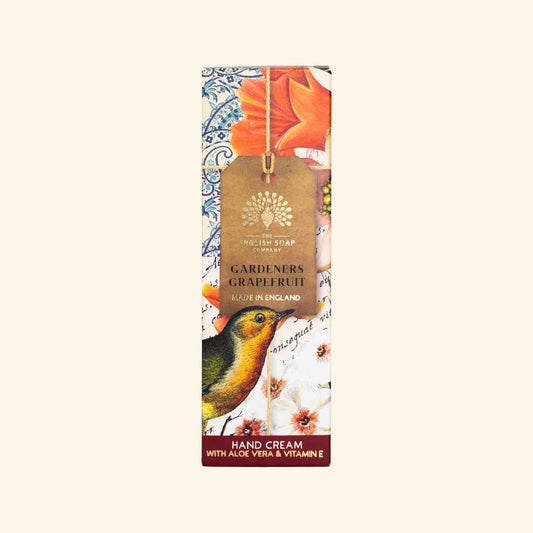 Hand cream packaging with floral design and bird illustration on a white background