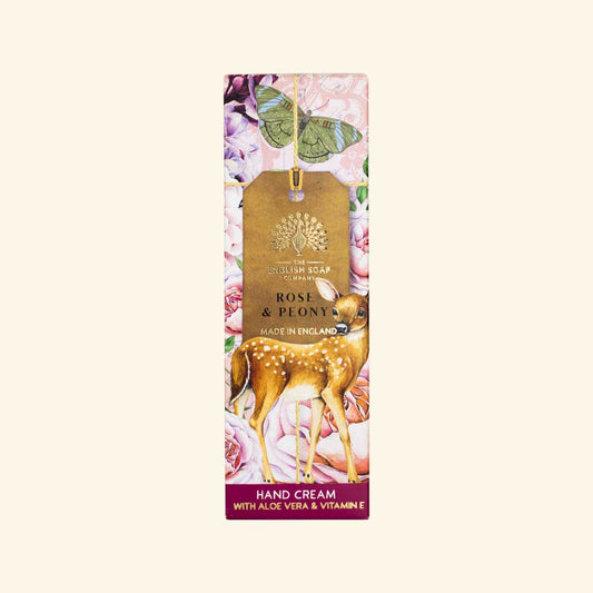 Hand cream anniversary packaging with a deer illustration and floral design on a white background
