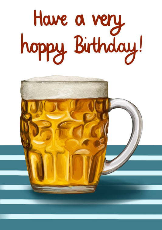 Mug of beer with 'Have a very hoppy Birthday!' text on a blue striped background