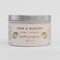 Candle tin labeled 'Pear & Blossom' with a decorative design on a white background