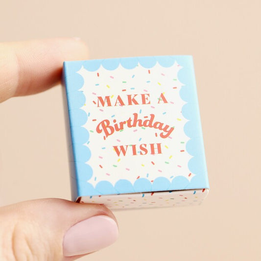 Small box with 'Make a Birthday Wish' text on a beige background