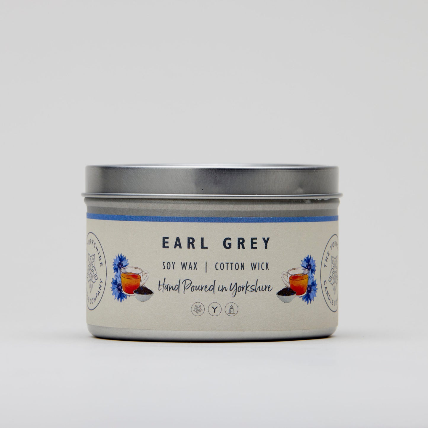 Candle tin labeled 'Earl Grey' with a white background