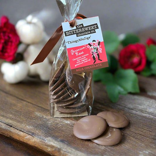 Bag of chocolate coins with a visible label on a wooden surface