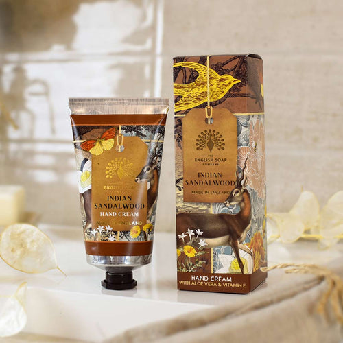 Hand cream with packaging featuring Indian sandalwood design on a neutral background