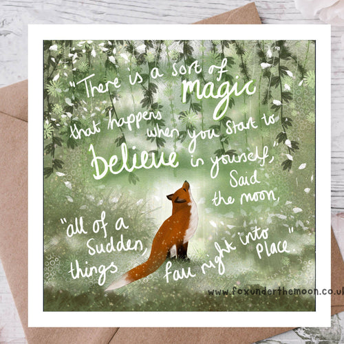 Greeting card with fox illustration and motivational quote on a wooden surface