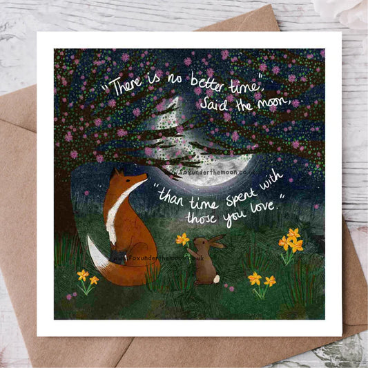 Greeting card with fox and rabbit under a moonlit sky, featuring a quote.