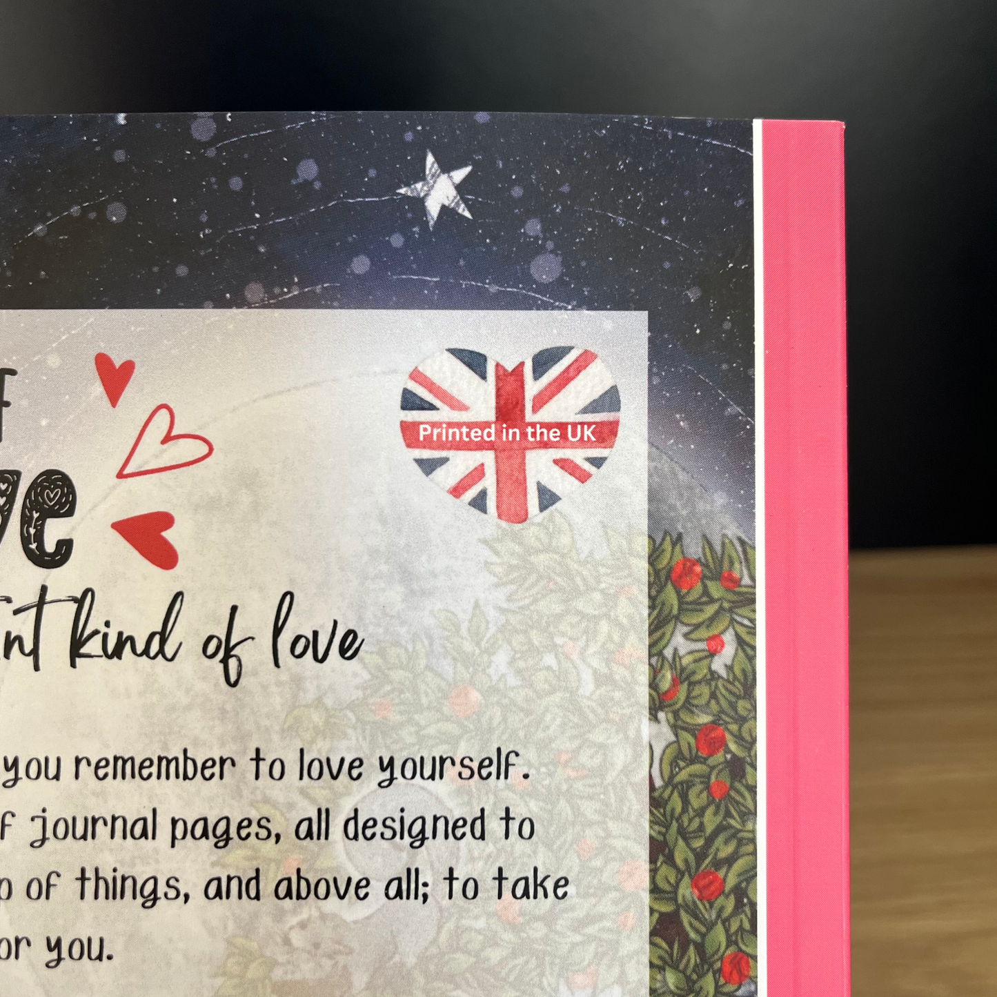 Journal with text and Union Jack flag on a dark background