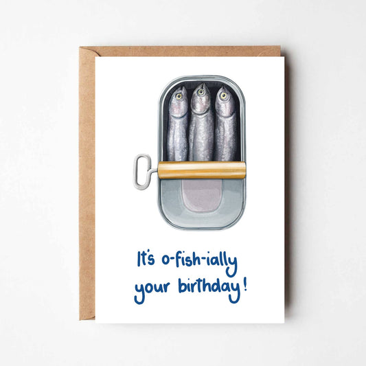 Greeting card with sardines in a tin and 'It's o-fish-ially your birthday!' text on a white background
