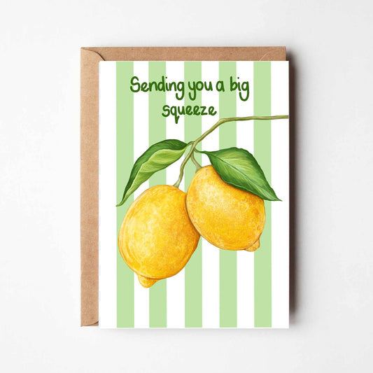 Greeting card with lemons and 'Sending you a big squeeze' text on a striped background