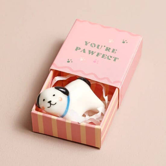 Dog-shaped product in a pink box with 'YOU'RE PAWFECT' text on a beige background