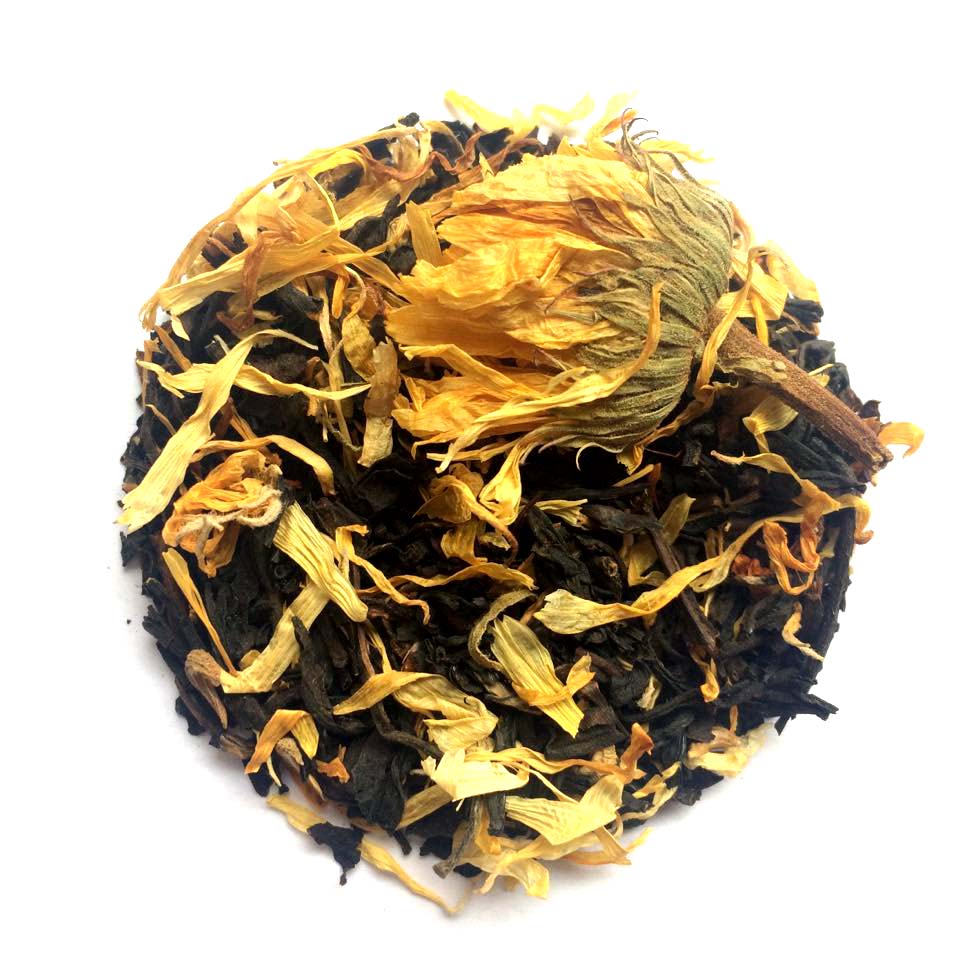 Dark Nottingham Lion loose leaf black tea mixed with golden marigold petals on a white background