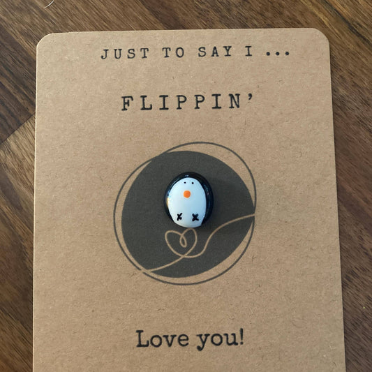 Penguin token on kraft card with Flippin' Love you wording