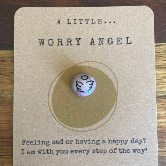 Worry bead on a card with text 