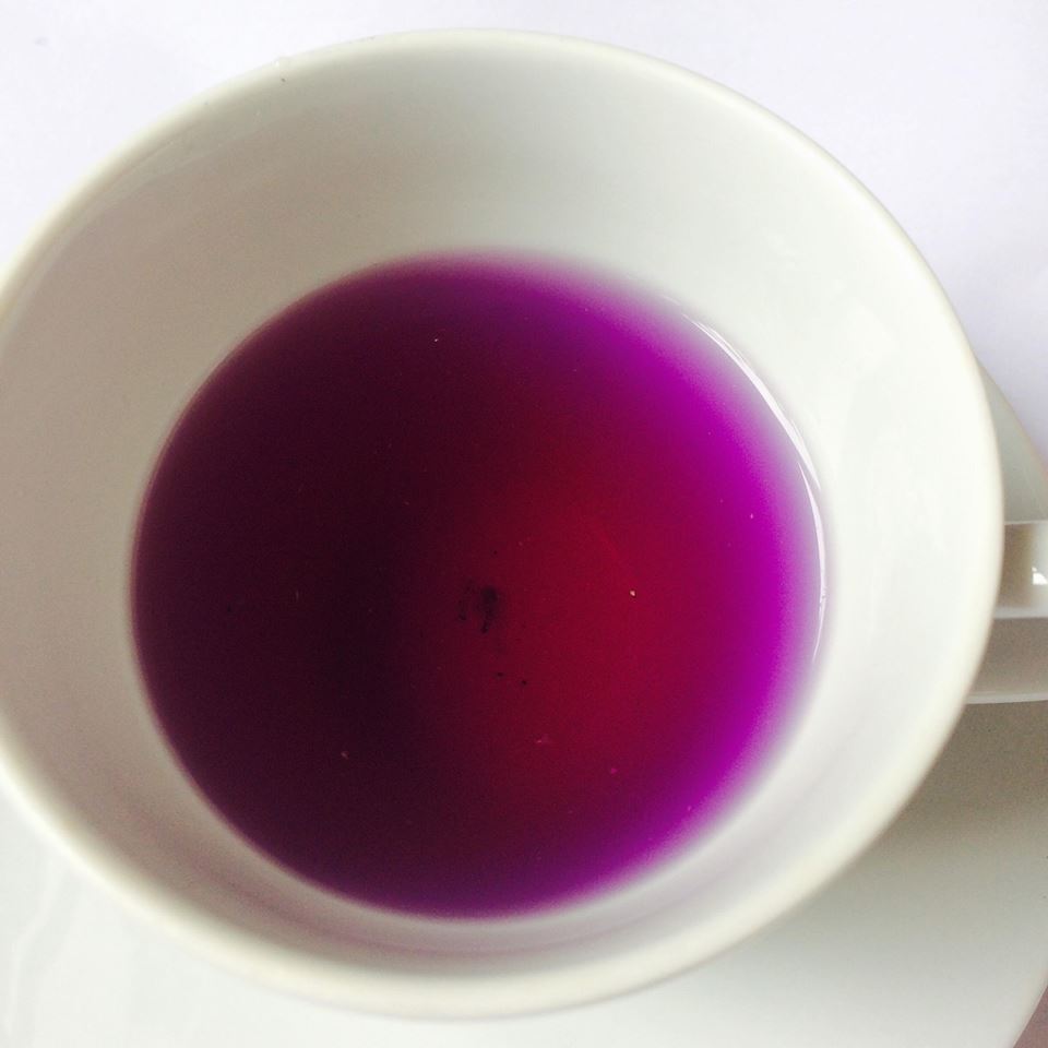 River Trent herbal tea turned purple in a white cup after lemon is added