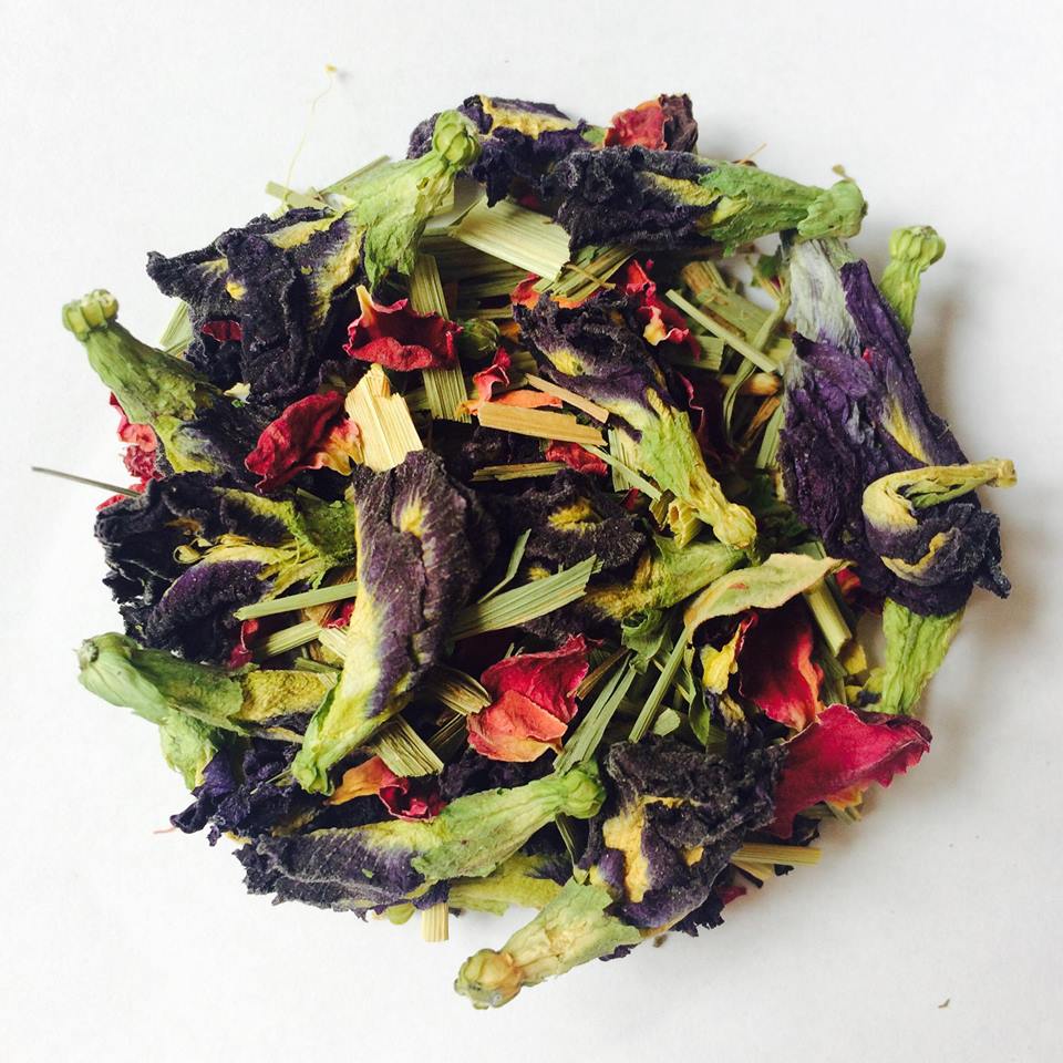 Deep blue River Trent herbal tea brewed in a white cup