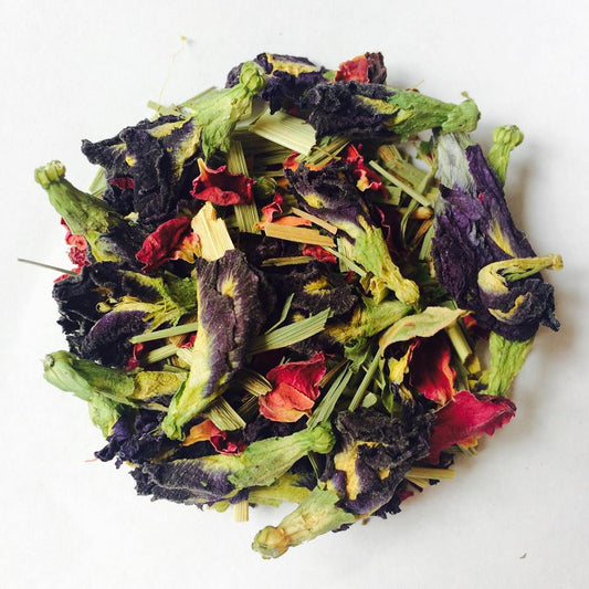 Deep blue River Trent herbal tea brewed in a white cup