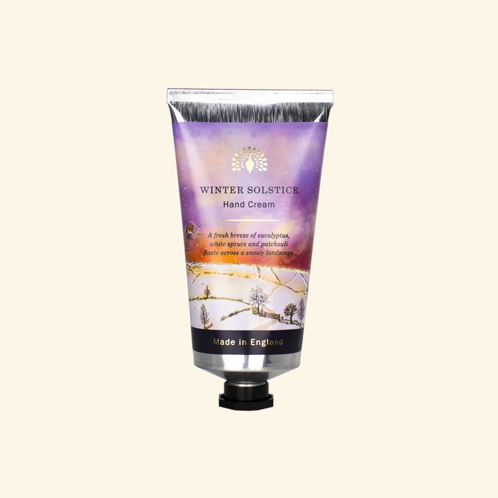 Hand cream tube labeled 'Winter Solstice' on a white background