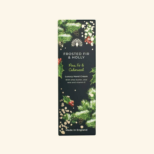 Hand cream packaging with festive design on a white background
