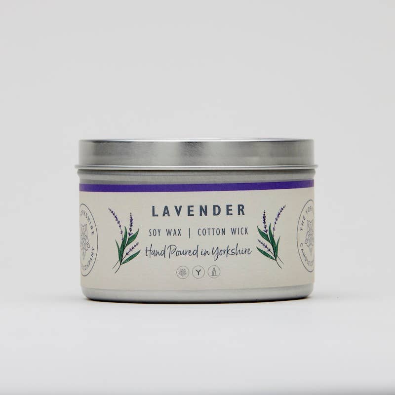 Lavender candle in a tin with a white background