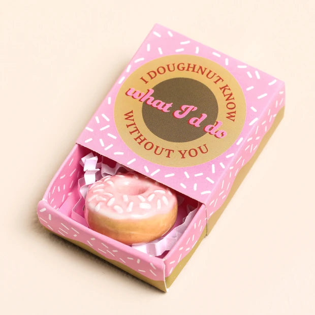 Lisa Angel ceramic doughnut token nestled in the pink sprinkle matchbox, lid open